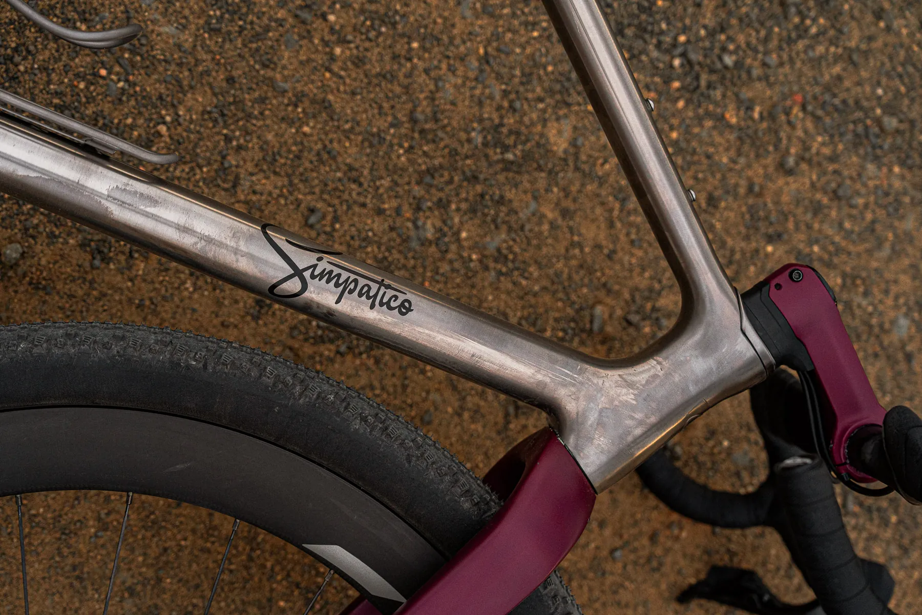 Close detail of titanium frame and coated fork.